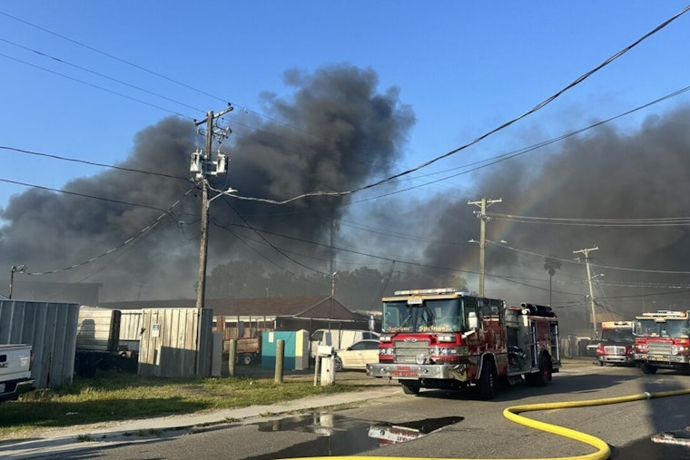 Tampa Fire Rescue Combats Blaze at Mechanic Shop and Scrapyard as Three Families Are Displaced