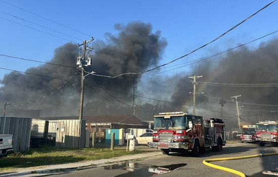 Tampa Fire Rescue Combats Blaze at Mechanic Shop and Scrapyard as Three Families Are Displaced