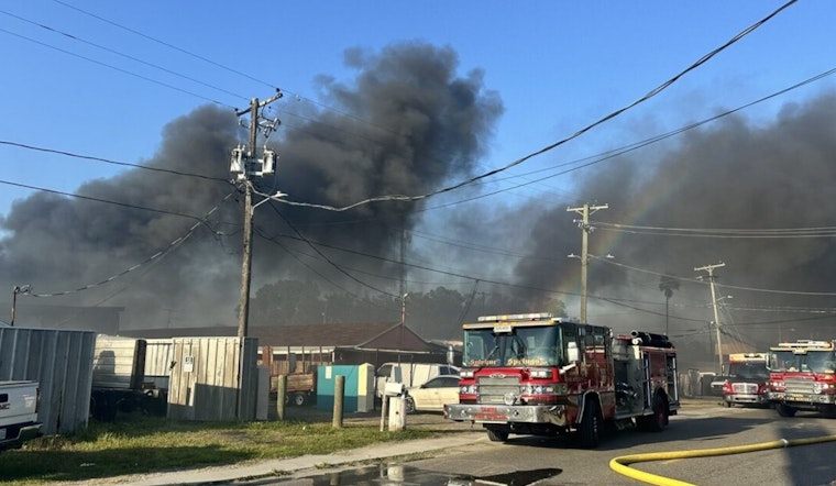 Tampa Fire Rescue Combats Blaze at Mechanic Shop and Scrapyard as Three Families Are Displaced
