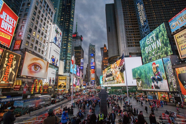Times Square Welcomes Thought-Provoking 12-Foot Bronze Statue of Young Woman in "Grounded in the Stars" Series