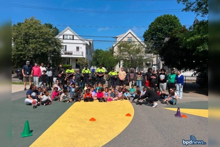 Boston Officers Teach Bike Safety at Roosevelt School's Event in Hyde Park