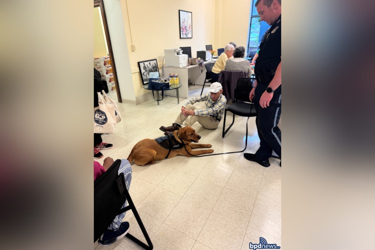 Boston Police Engage with Brighton Seniors, Spread Joy with Visit and Comfort Dog Copper