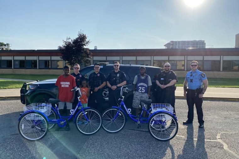 Coon Rapids Police and Toys 4 Joy Partner Up to Gift New Tricycles to Local Brothers in Need