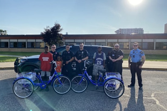 Coon Rapids Police and Toys 4 Joy Partner Up to Gift New Tricycles to Local Brothers in Need