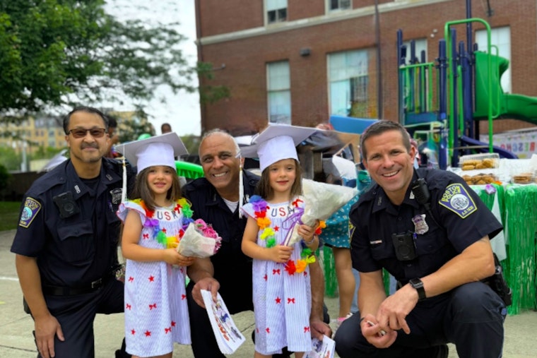 Boston Police Celebrate Preschool Graduates at Kennedy Center School in Charlestown with Safety Coloring Books