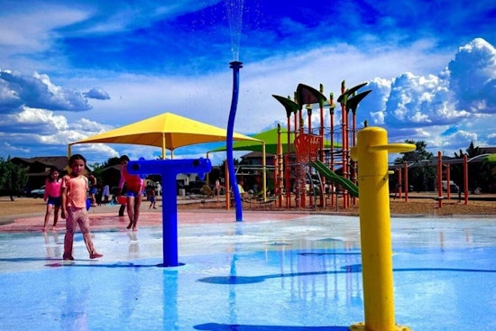 Las Cruces Police Partner with Raising Cane's for Community Engagement at Metro Verde Splash Pad