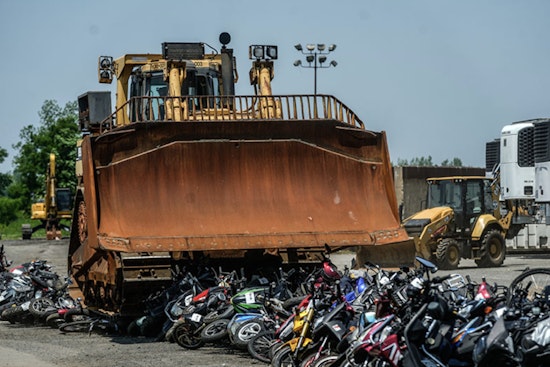 New York City Officials Crush Illegal Mopeds and E-Bikes in Staten Island to Uphold Traffic Laws