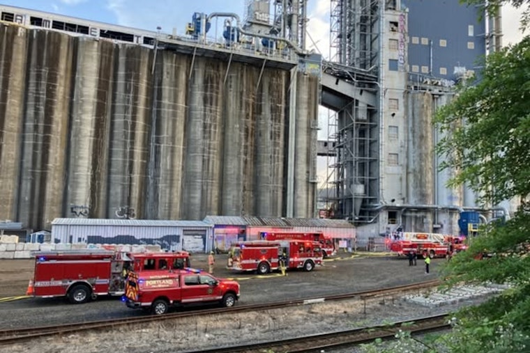 Portland Firefighters Extinguish Blaze at Historic Grain Facility Amid Starlight Parade Festivities