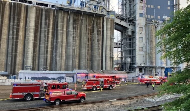 Portland Firefighters Extinguish Blaze at Historic Grain Facility Amid Starlight Parade Festivities