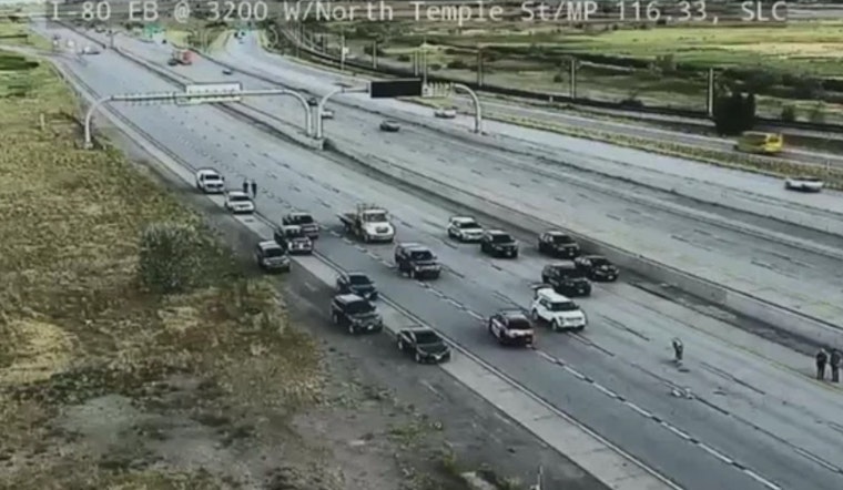 Salt Lake City Interstate Shutdown: Suspect Exchanges Gunfire with Police and Tow Truck Driver, Leading to Critical Injury and Rush Hour Traffic Chaos