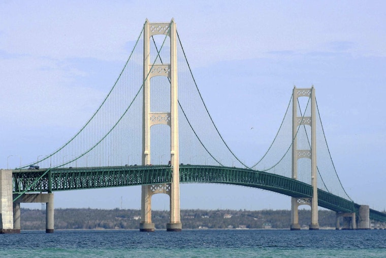 Smoke from Canadian Wildfires Shrouds Michigan's Mackinac Bridge, Prompting Alerts and Reducing Visibility
