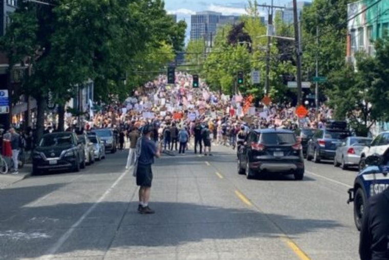 Thousands March Peacefully Through Seattle Supported by Police Outreach Team