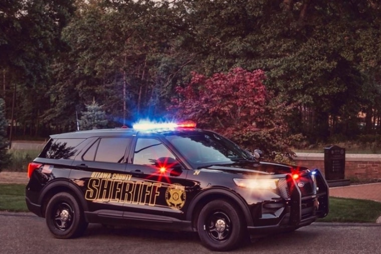 Two Injured in Collision Between Motorcycle and Jaguar in Spring Lake Township