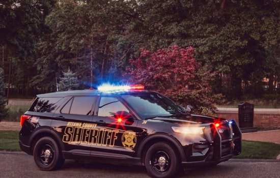 Two Injured in Collision Between Motorcycle and Jaguar in Spring Lake Township
