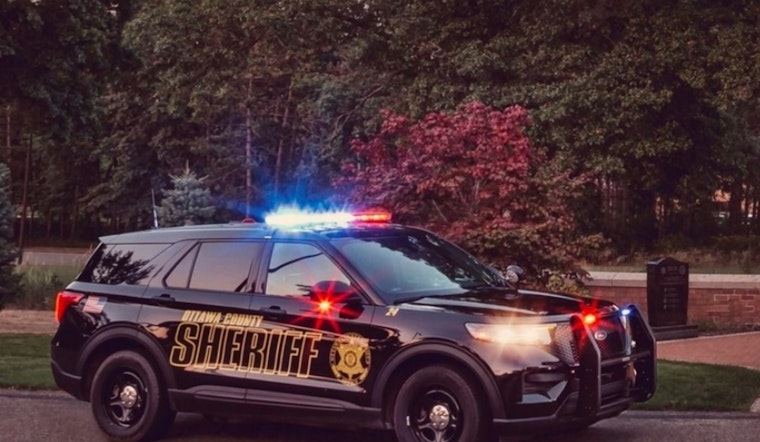 Two Injured in Collision Between Motorcycle and Jaguar in Spring Lake Township