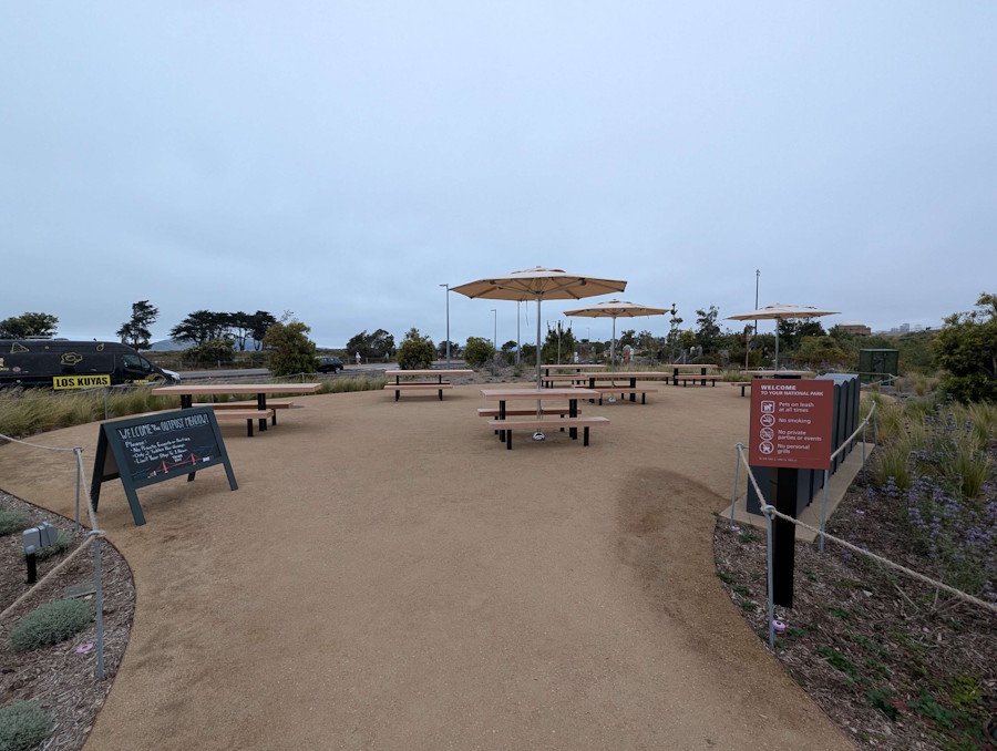 First come first serve picnic area with families enjoying outdoor dining