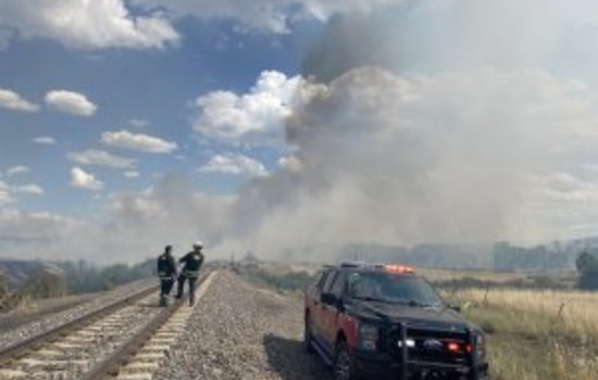 Airport Fire near Louviers Linked to Train Activities, Weather Aids Firefighting Efforts