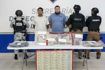 Binational Operation Nabs Two Suspected Alien Smugglers in Cd. Juarez, Seizes Weapons and Cash