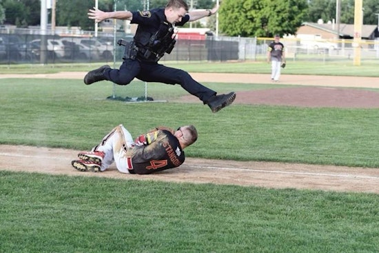 Bloomington's Finest Swap Gear for Gloves in Friendly Police vs. Fire Department Softball Game at Toro Stadium