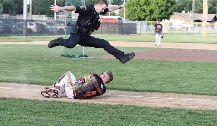Bloomington's Finest Swap Gear for Gloves in Friendly Police vs. Fire Department Softball Game at Toro Stadium