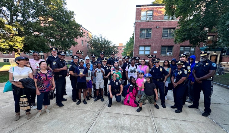 Boston Police and Community Members Join Forces in Jamaica Plain Flashlight Walk to Strengthen Bonds and Safety