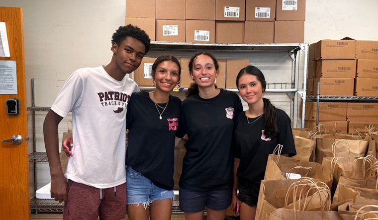 Boston Police and Youth Leaders Join Forces at Haitian Multi-Service Center to Aid Families in Need