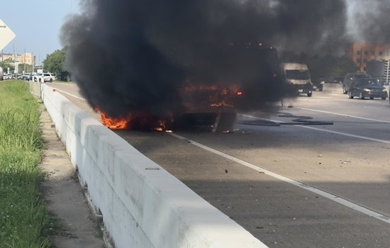 Emergency Crews Extinguish Vehicle Fire on N Sam Houston Parkway, No Injuries Reported