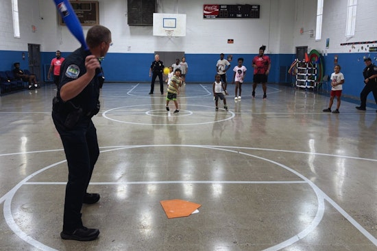 Knoxville Police Swap Patrol for Play in Community Building Wiffle Ball Game with Local Youth