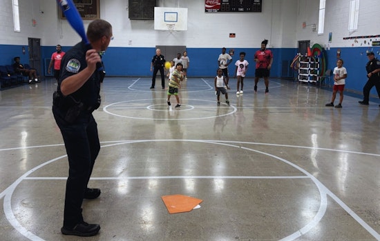 Knoxville Police Swap Patrol for Play in Community Building Wiffle Ball Game with Local Youth