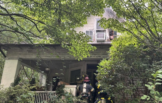 Knoxville Woman and Pet Dog Rescued from Blazing Home as Firefighters Overcome Obstacles