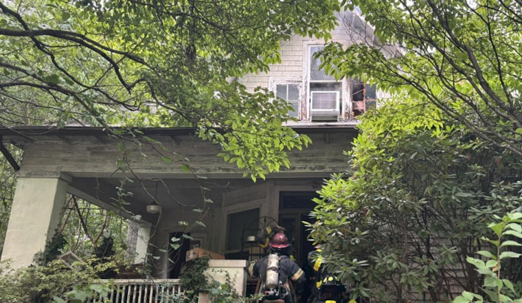 Knoxville Woman and Pet Dog Rescued from Blazing Home as Firefighters Overcome Obstacles