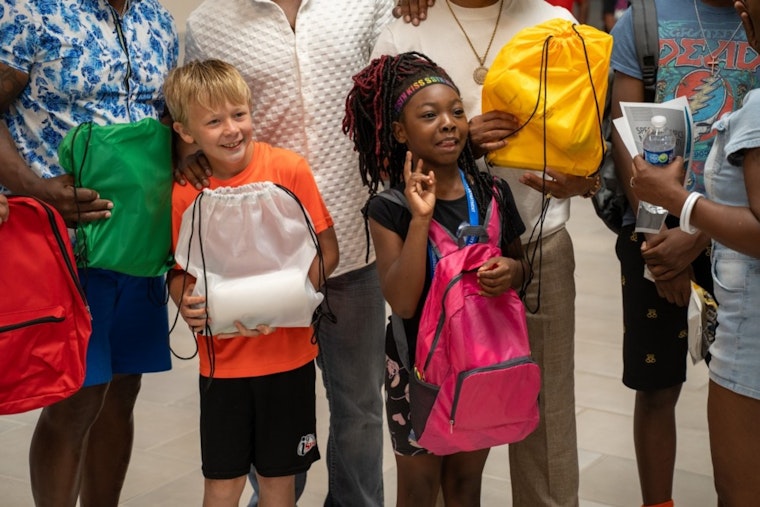 Lawrence Community Embraces Students with Back to School Celebration and Supportive Giveaways