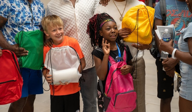 Lawrence Community Embraces Students with Back to School Celebration and Supportive Giveaways