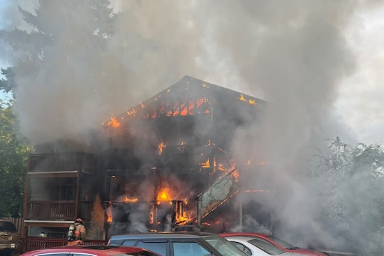 Massive Fire Engulfs Portland Apartment Complex, 2 Hospitalized; Cause Under Investigation with One Detained