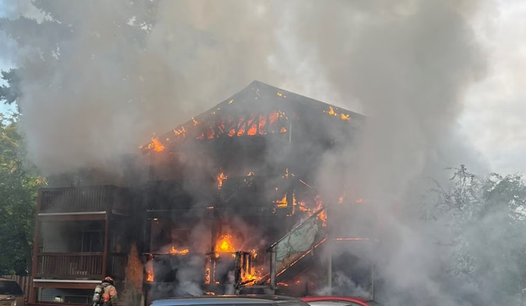 Massive Fire Engulfs Portland Apartment Complex, 2 Hospitalized; Cause Under Investigation with One Detained
