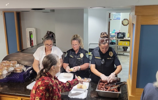 Midwest City Police Serve Up Smiles and Hot Dogs at Senior Housing 4th of July Celebration