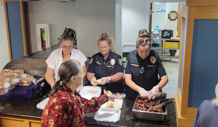 Midwest City Police Serve Up Smiles and Hot Dogs at Senior Housing 4th of July Celebration