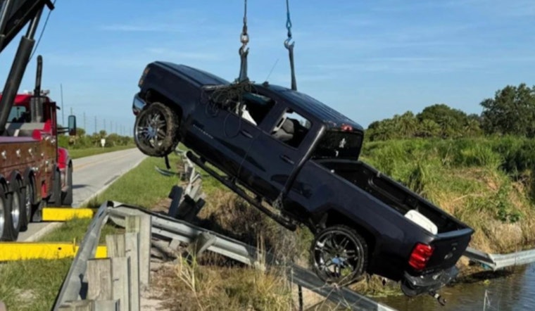 Mystery Unfolds as Divers Recover Empty Truck from Fort Pierce Canal as Sheriff's Deputies Search for Missing Occupants