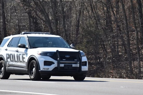 Police Negotiate with Individual Barricaded with Children After Domestic Dispute