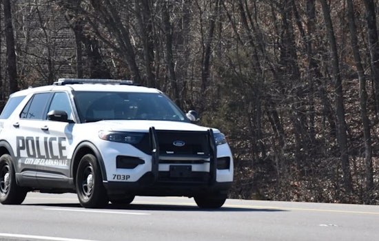 Police Negotiate with Individual Barricaded with Children After Domestic Dispute
