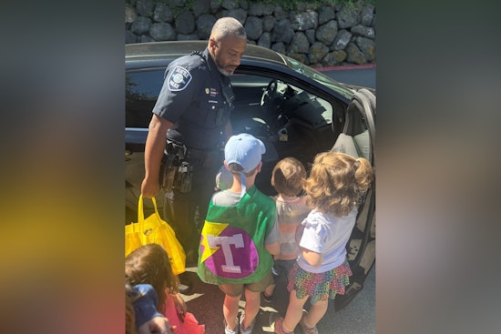 Seattle Police Engage with Kids at Local School Summer Camp for 'Community Helpers' Week