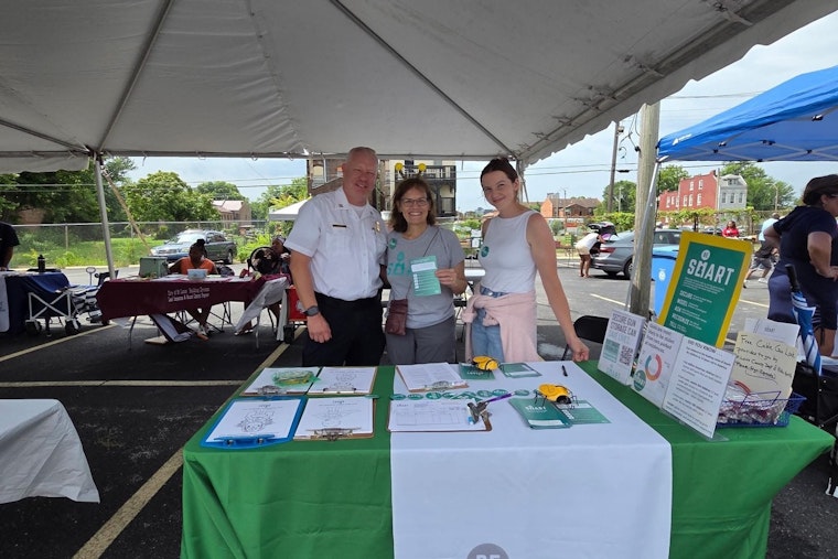 St. Louis Police Mix Mingling and Safety Education at Temple Church's Back to School Fair