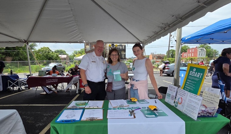 St. Louis Police Mix Mingling and Safety Education at Temple Church's Back to School Fair