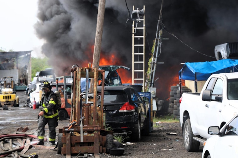 Tampa Salvage Yard Engulfed by Forklift Fire, 20 Cars Damaged and One Hospitalized with Burns