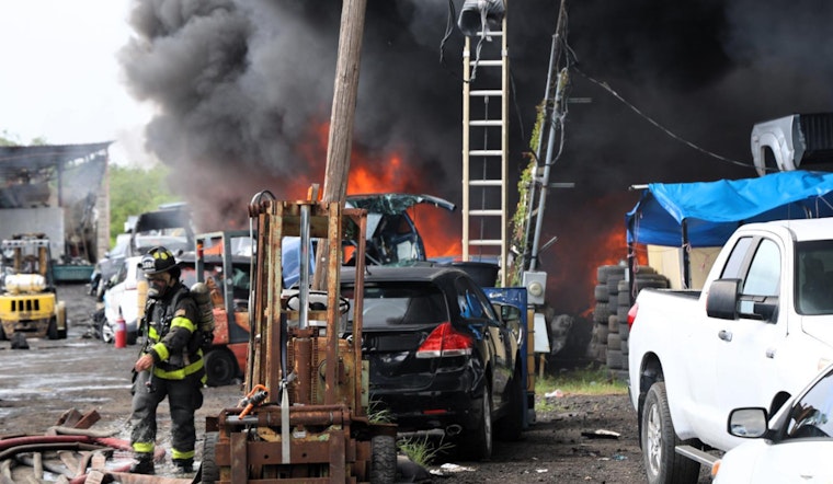 Tampa Salvage Yard Engulfed by Forklift Fire, 20 Cars Damaged and One Hospitalized with Burns