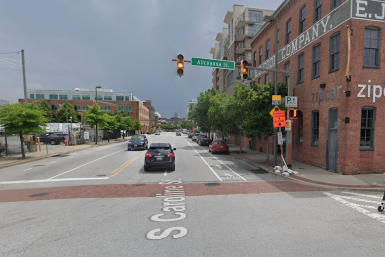 Unprecedented Scene in Baltimore: Car Ignites Amidst Floodwaters in Fells Point, Mayor Cites Climate Change as Culprit