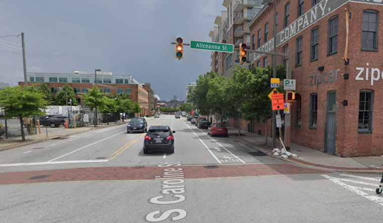 Unprecedented Scene in Baltimore: Car Ignites Amidst Floodwaters in Fells Point, Mayor Cites Climate Change as Culprit