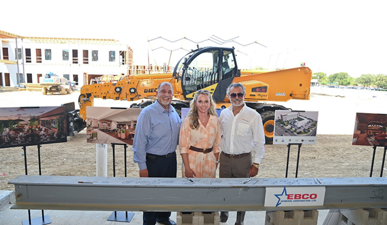 Arlington Embraces Past and Future with Topping-Out Ceremony for Caravan Court Hotel
