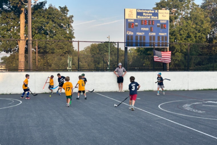 Boston Police Engage with Community at Bill McGregor Street Hockey Event in Roslindale