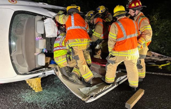 Driver Rescued After Vehicle Flips and Becomes Entangled in Powerlines Near Woodland